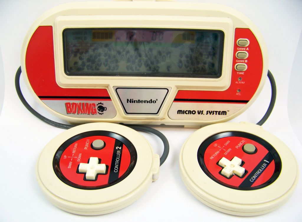 Nintendo boxing. Nintendo Micro vs. Nintendo Micro vs System. Нинтендо микро консоль. Портативная игровая консоль Nintendo ретро.