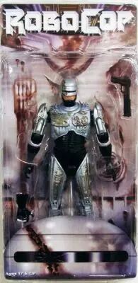 Figurine RoboCop – NECA Ultimate – Battle-Damaged Avec Chaise – 18cm