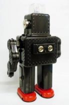 Robot - Battery Operated Tin Robot - Smoking Space Man (Ha Ha Toys) black