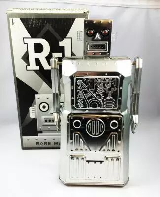 Robot - Robot Marcheur � Pile en T�le - Robot One R-1 (Rocket USA) M�tal