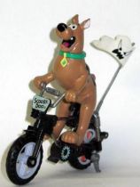 Scooby-Doo on motorised all terrain cycle