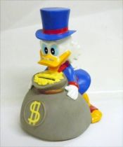 Scrooge - Merchandising - Vinyl Bank Scrooge holding a bag of gloden dollars