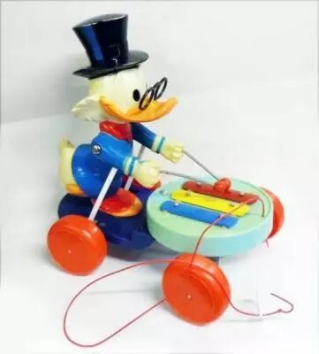 Scrooge - Pull-up Toy - Scrooge and his xylophone