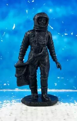 Space Toys - Figurines Plastiques - Cosmonaute tenant appareil (Bonux couleur noire)