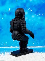 Space Toys - Plastic Figures - Cosmonaut seating (Bonux black color)