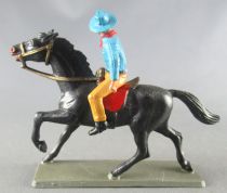 Starlux - Cow-Boys - Series 63 (Luxe) - Mounted Firing gun right hand (blue & yellow) black horse (ref 44145)