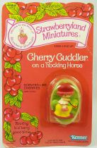 Strawberry shortcake - Miniatures - Cherry Cuddler on a Rocking Horse