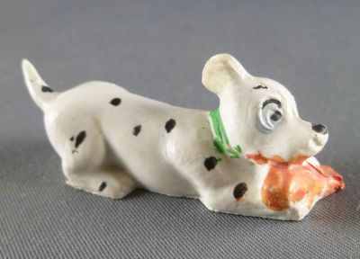 The 101 dalmatians - Jim figure - Puppy laying  with bone (green collar)