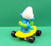 The Smurfs - Hardee\'s - Smurf with buoy on yellow skateboard