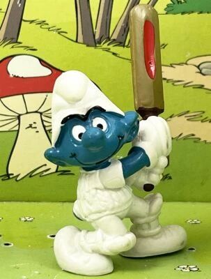 The Smurfs - Schleich - 20066 Cricket Smurf (ocher & red bat)