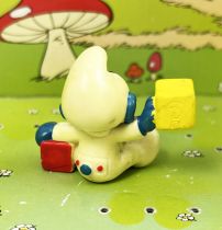 The Smurfs - Schleich - 20214 Baby Smurf with Blocks (yellow)