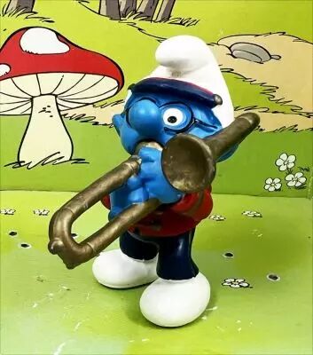 The Smurfs - Schleich - 20483 Braindy Smurf on parade playing trombone
