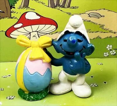 The Smurfs - Schleich - 20490 Easter Smurf with blue & rose egg (W. Berrie Co.)