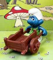 The Smurfs - Schleich - 40206 Smurf gardener with wheelbarrow (brown)