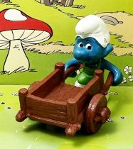 The Smurfs - Schleich - 40206 Smurf gardener with wheelbarrow (brown)