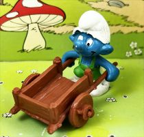 The Smurfs - Schleich - 40206 Smurf gardener with wheelbarrow (brown)