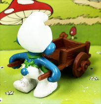 The Smurfs - Schleich - 40206 Smurf gardener with wheelbarrow (brown)