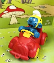 The Smurfs - Schleich - 40210 Smurf driving red car