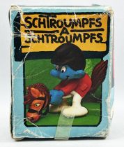 The Smurfs - Schleich - 40214 Smurf on Hobby Horse (mint in box)