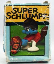 The Smurfs - Schleich - 40214 Smurf on Hobby Horse (mint in box)