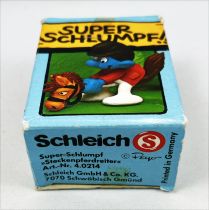 The Smurfs - Schleich - 40214 Smurf on Hobby Horse (mint in box)