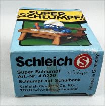 The Smurfs - Schleich - 40220 Schoolboy Smurf on school\'s bench (mint in box)