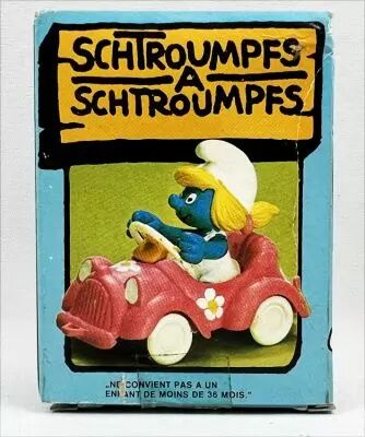 The Smurfs - Schleich - 40241 Smurfette drives a pink car (w/box)