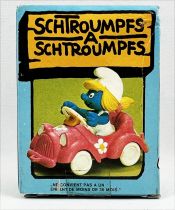 The Smurfs - Schleich - 40241 Smurfette drives a pink car (w/box)