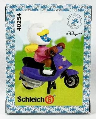 The Smurfs - Schleich - 40254 Smurfette with Scooter (New Look Box)