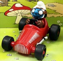The Smurfs - Schleich - 40255 Smurf with race car (red)