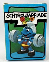 The Smurfs - Schleich - 40507 Olympic Smurf weight lifter (mint in box)