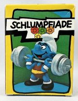 The Smurfs - Schleich - 40507 Olympic Smurf weight lifter (mint in box)