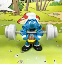 The Smurfs - Schleich - 40507 Smurf weight lifter