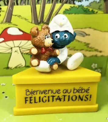 The Smurfs - Schleich - Baby Smurf with plush \'\'Welcome to Baby : Congratulations!\'\' (yellow base)