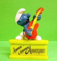 The Smurfs - Schleich - Smurf with bass \'\'Happy Birthday\'\' (yellow base)