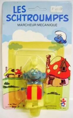 The Smurfs - Wind up C�ji - Smurf with present (mint on card)