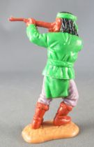 Timpo - Apaches - Footed firing rifle green torso leaning to the right legs (green apron lilac pants brown boots)