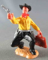 Timpo - Cow-Boys - 3rd Series - Footed Right Arm Outstretched (pistol) Left Arm (Bank Bag) yellow Shirt Kneeling Black legs