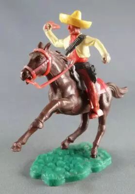 Timpo - Mexicains - Cavalier ceinture moul�e bras droit lev� veste jaune fouet pantalon marron sombrero jaune cheval brun galop