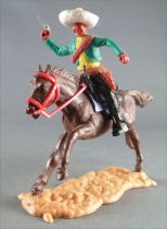 Timpo - Mexicains - Cavalier ceinture moulée bras droit levé veste verte révolver pantalon noir sombrero blanc cheval brun galop