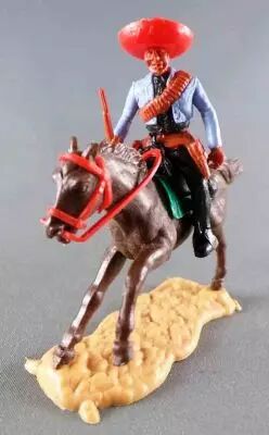 Timpo - Mexicains - Cavalier Ceinture Moul�e Bras Gauche en Bas Veste Bleue Winchester Pantalon Noir Cheval Brun Galop Long