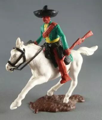 Timpo - Mexicains - Cavalier ceinture moul�e bras gauche en bas veste verte winchester & r�volver pantalon marron sombrero noir