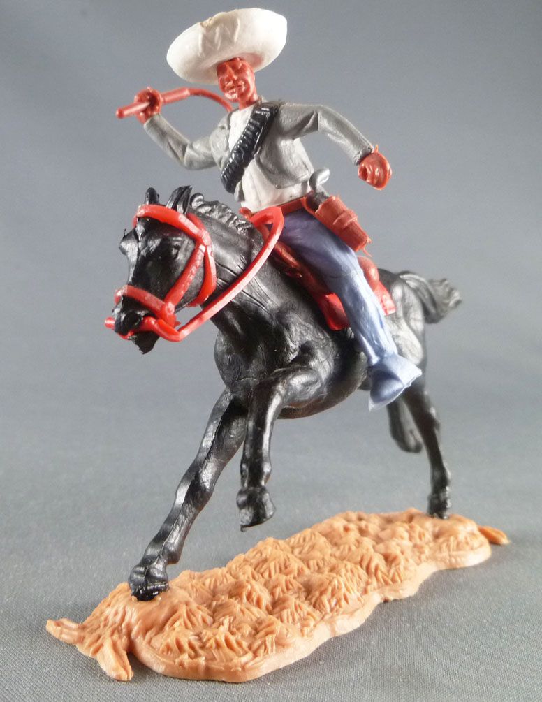 Timpo - Mexicains - Cavalier ceinture séparée bras droit levé veste grise  fouet pantalon bleu sombrero blanc cheval