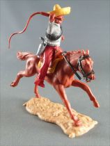 Timpo - Mexicains - Cavalier ceinture séparée bras droit levé veste grise fouet pantalon rouge sombrero jaune cheval marron 
