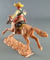 Timpo - Mexicains - Cavalier ceinture séparée bras droit tendu veste jaune révolver pantalon crème sombrero jaune cheval baie