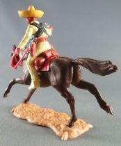 Timpo - Mexicains - Cavalier ceinture séparée bras droit tendu veste jaune révolver pantalon jaune sombrero jaune cheval brun