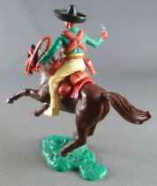Timpo - Mexicains - Cavalier ceinture séparée bras droit tendu veste verte révolver pantalon jaune sombrero noir cheval brun