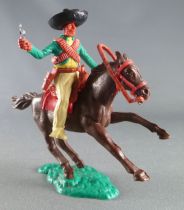 Timpo - Mexicains - Cavalier ceinture séparée bras droit tendu veste verte révolver pantalon jaune sombrero noir cheval brun