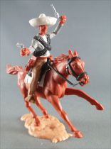Timpo - Mexicains - Cavalier ceinture séparée bras gauche levé veste grise 2 révolvers pantalon crème sombrero blanc cheval marr