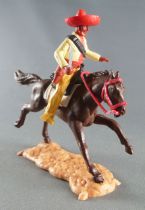 Timpo - Mexicains - Cavalier ceinture séparée pose du couteau veste jaune pantalon jaune citron sombrero rouge cheval brun galop